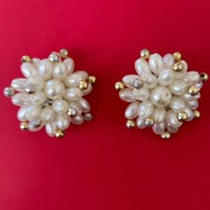 Pearl like cream color earrings with gold accents clip on back comfortable.